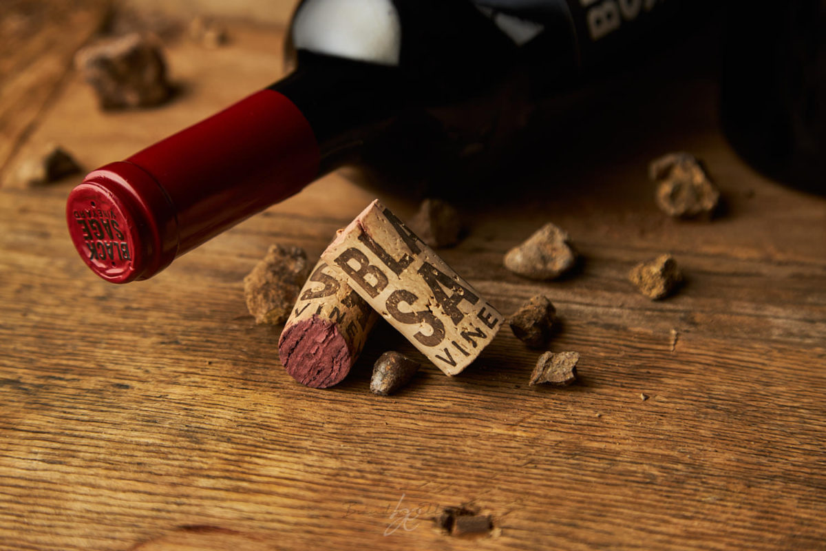 kelowna photographer captures black sage wine cork and wine bottle